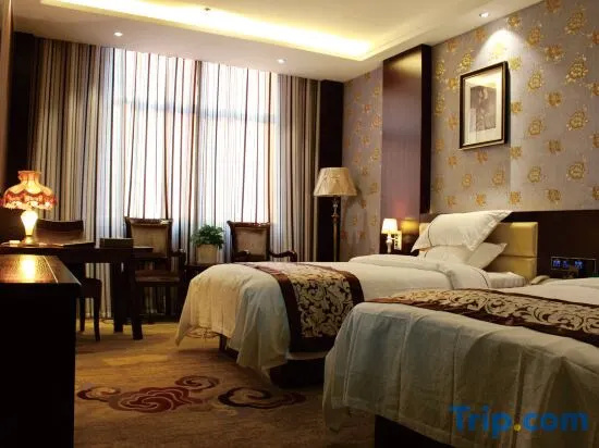Cen Yang Hotel - Chambres