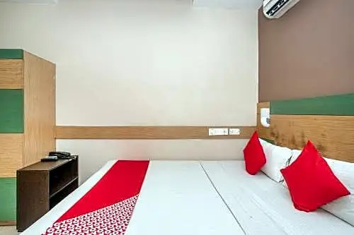 FabExpress Emirates Suites - Chambres