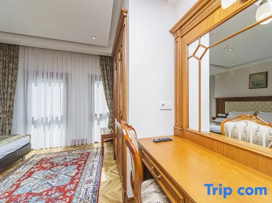 Spectra Hotel - Chambres
