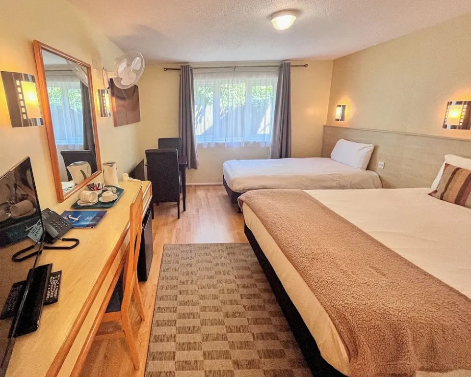 Travel Plaza Hotel - Chambres