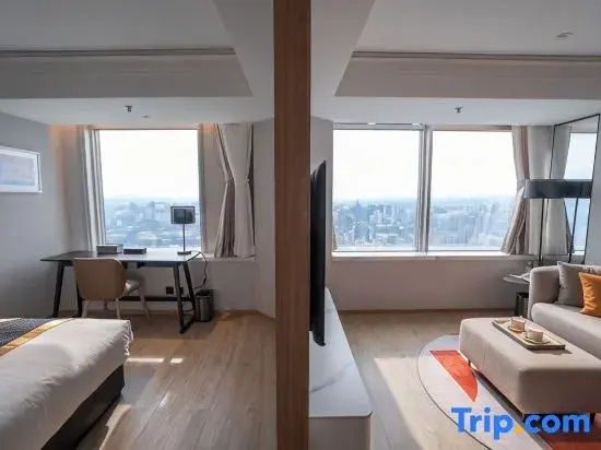 Jingguang Center Apartment Hotel - Chambres