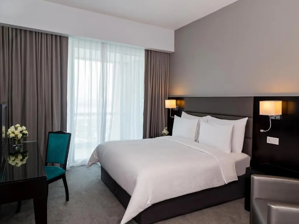 Flora Creek Deluxe Hotel Apartments Dubai - Chambres