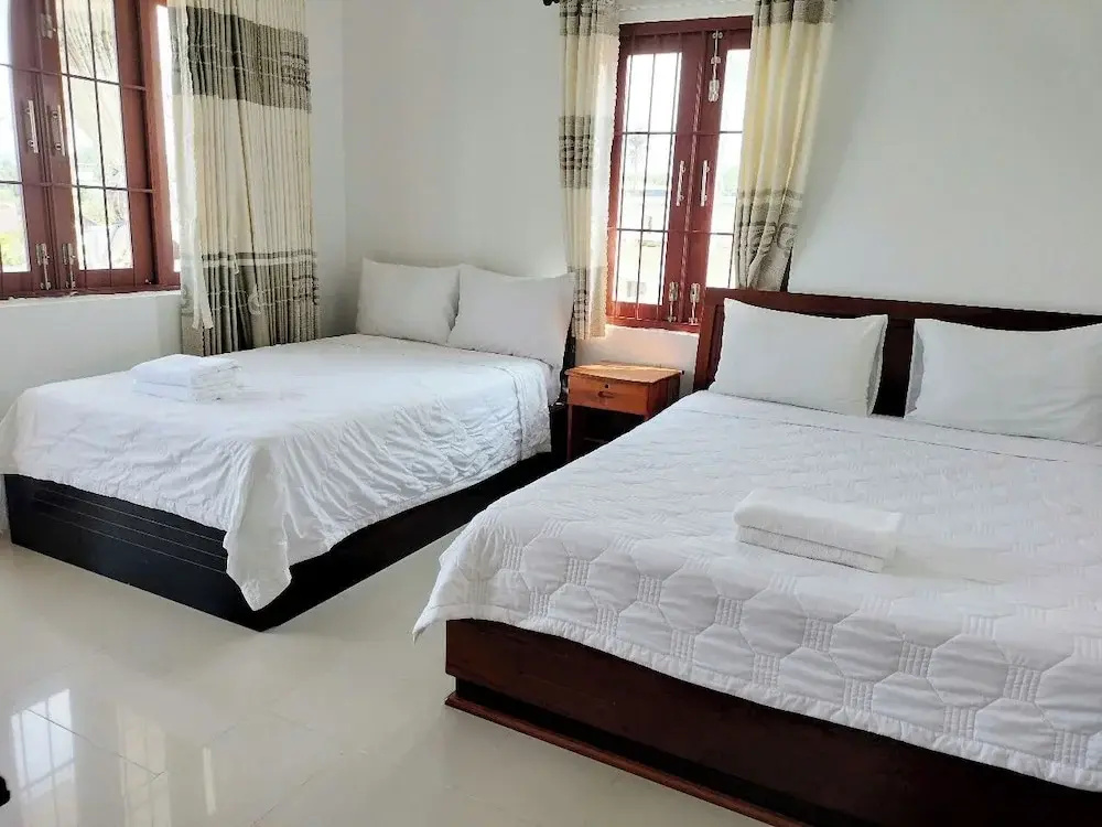 Standard Triple room with garden view