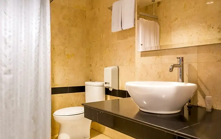 Garuda Plaza Hotel - Chambres
