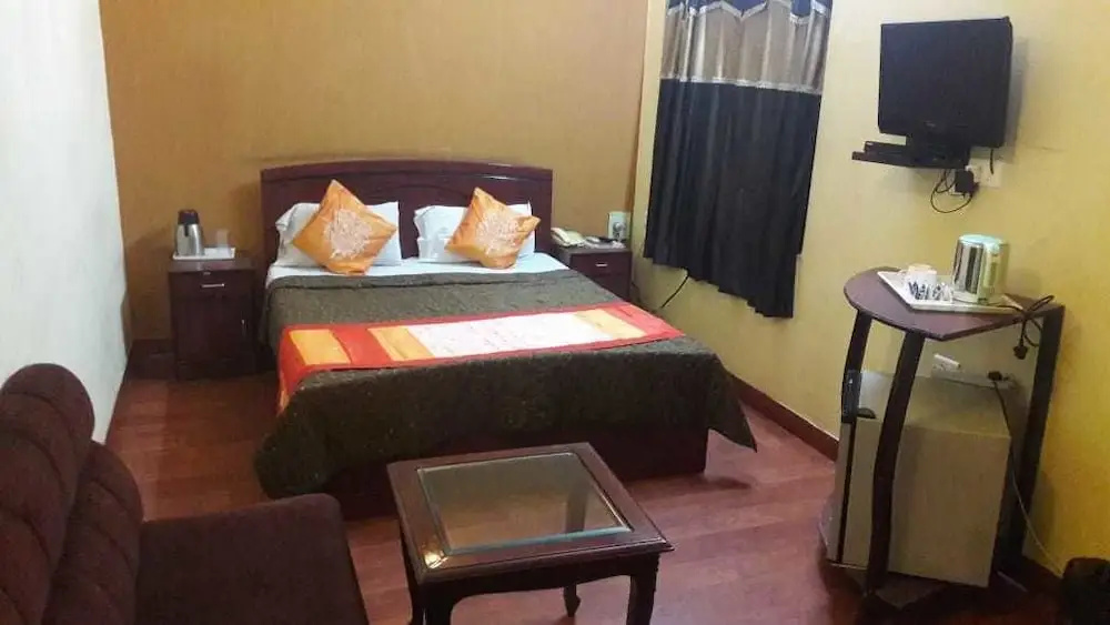 Jypore Saffron Inn & Suites - Chambres