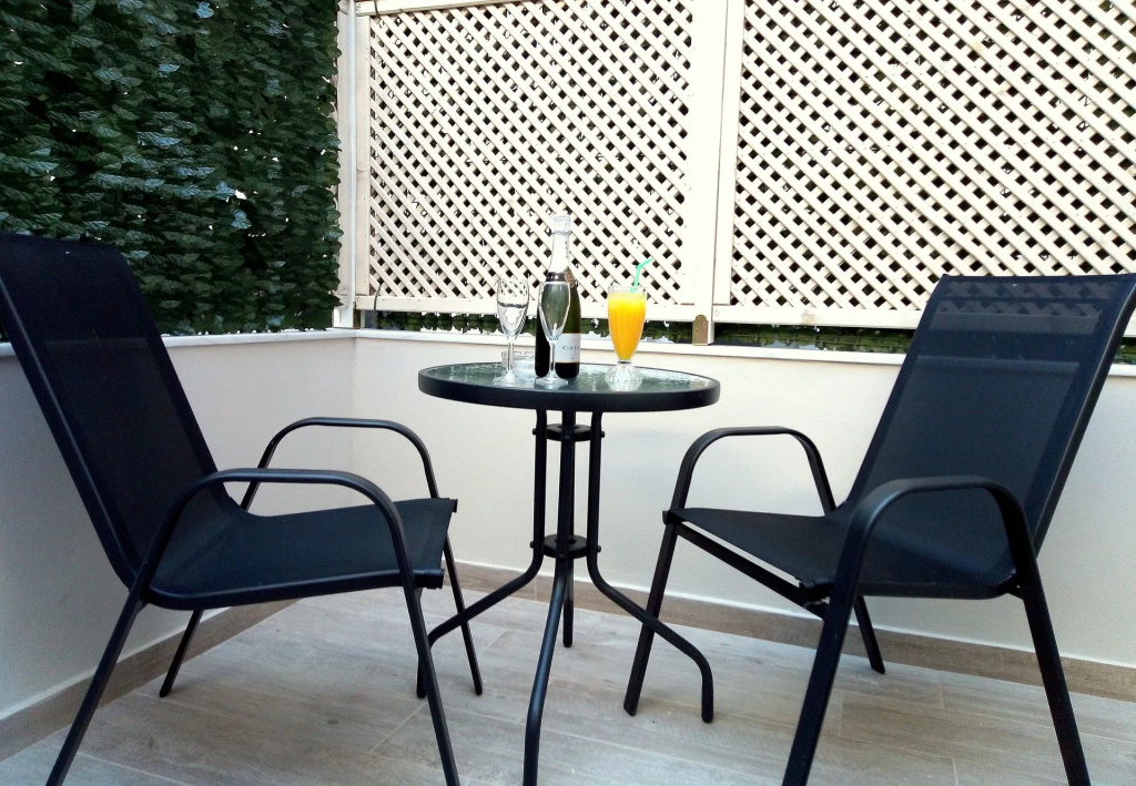 Caravel Apartment Hotel - Chambres