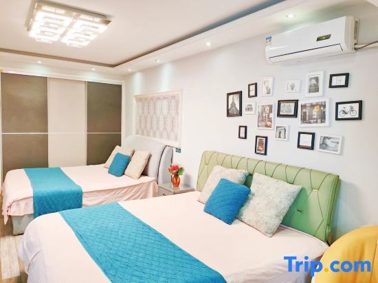 Двухместный люкс с видом на море двуспальная кровать в Rizhao Shuohai Seaview Homestay (Wanpingkou Branch)