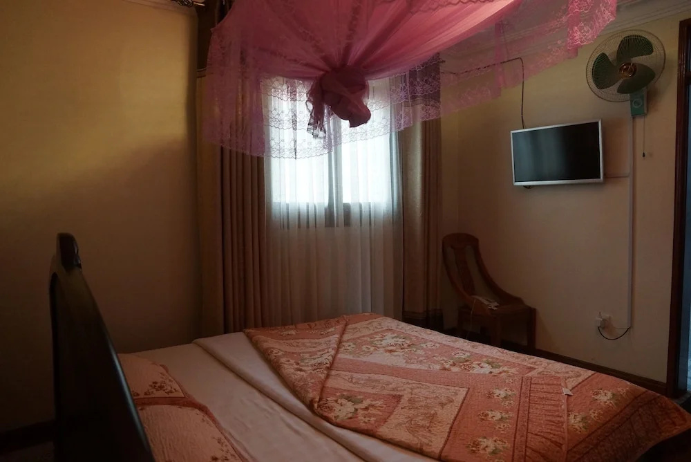 Entebbe Travelle'rs Inn - Chambres