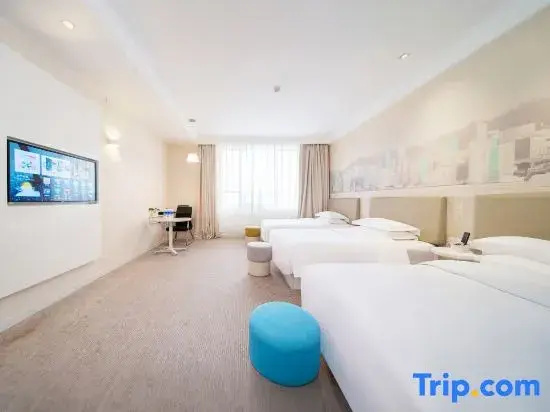 Tian Long Hotel - Chambres