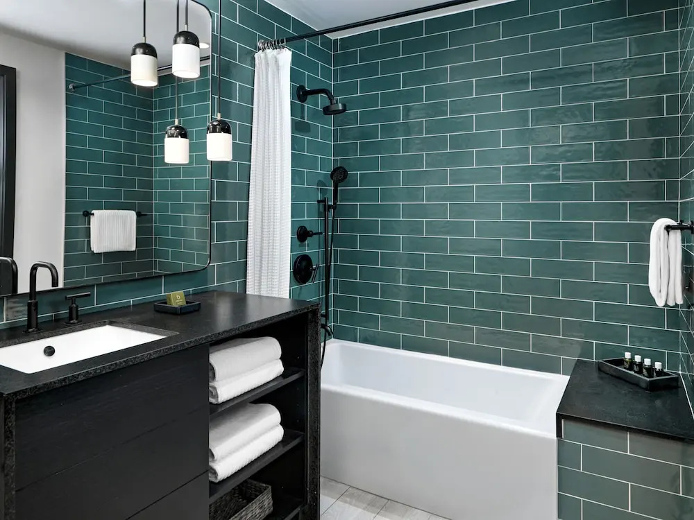 Deluxe Quadruple room with balcony