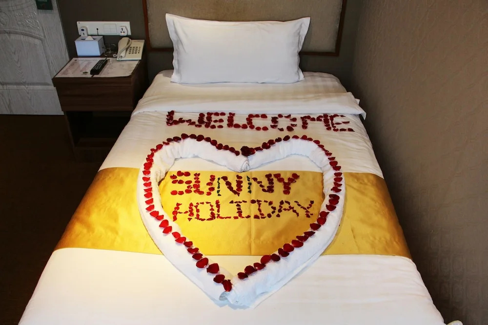 Sunny Holiday Hotel - Chambres