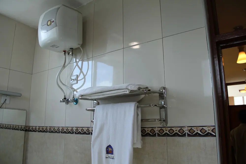 Safina Hotel & Apartments - Chambres