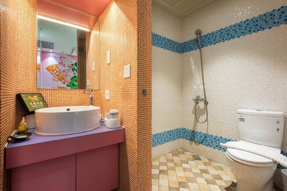 Shi Chi Hotel - Chambres