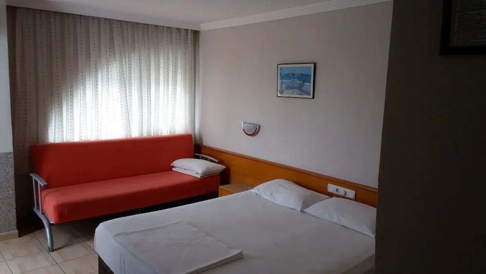 Трёхместный номер Standard в Isinda Hotel