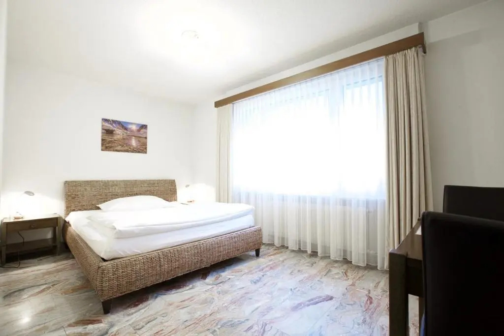Hotel Europe Garni - Chambres