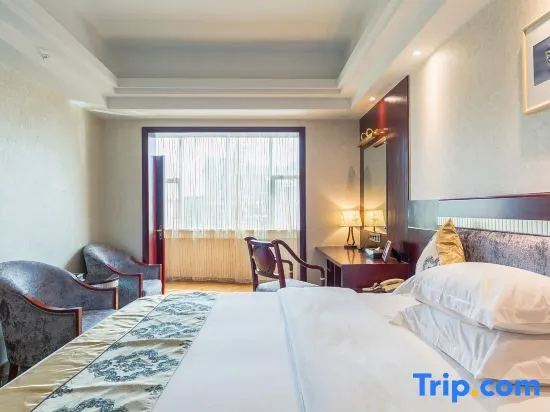 Yi Long Hotel - Chambres