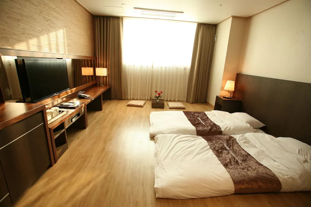 Hyunjin Tourist Hotel - Chambres