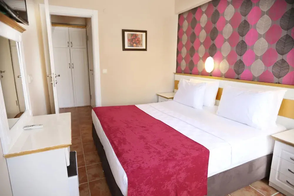 Deluxe Quadruple room with balcony