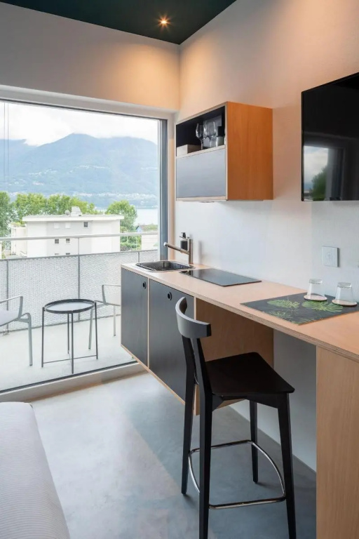 Standard Quadruple room with balcony and with lake view
