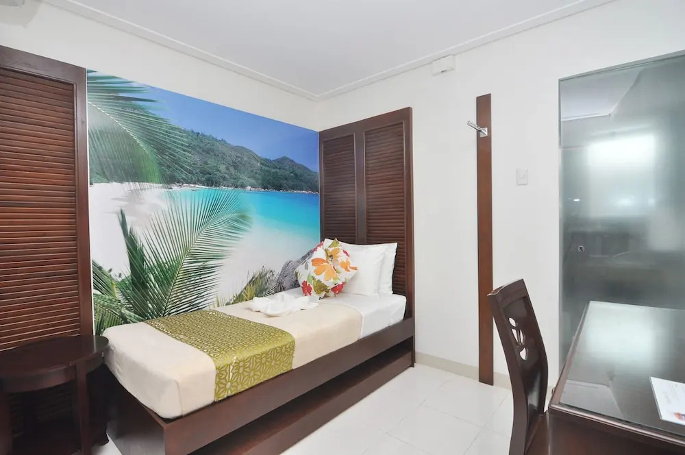 717 Cesar Place Hotel - Chambres