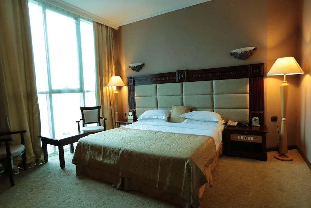 Friendship International Hotel - Chambres