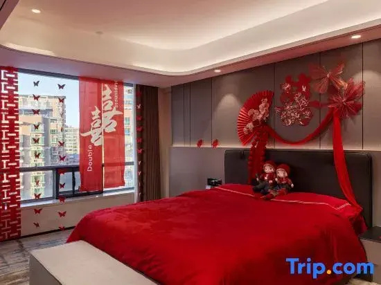 Xinli Hotel - Chambres