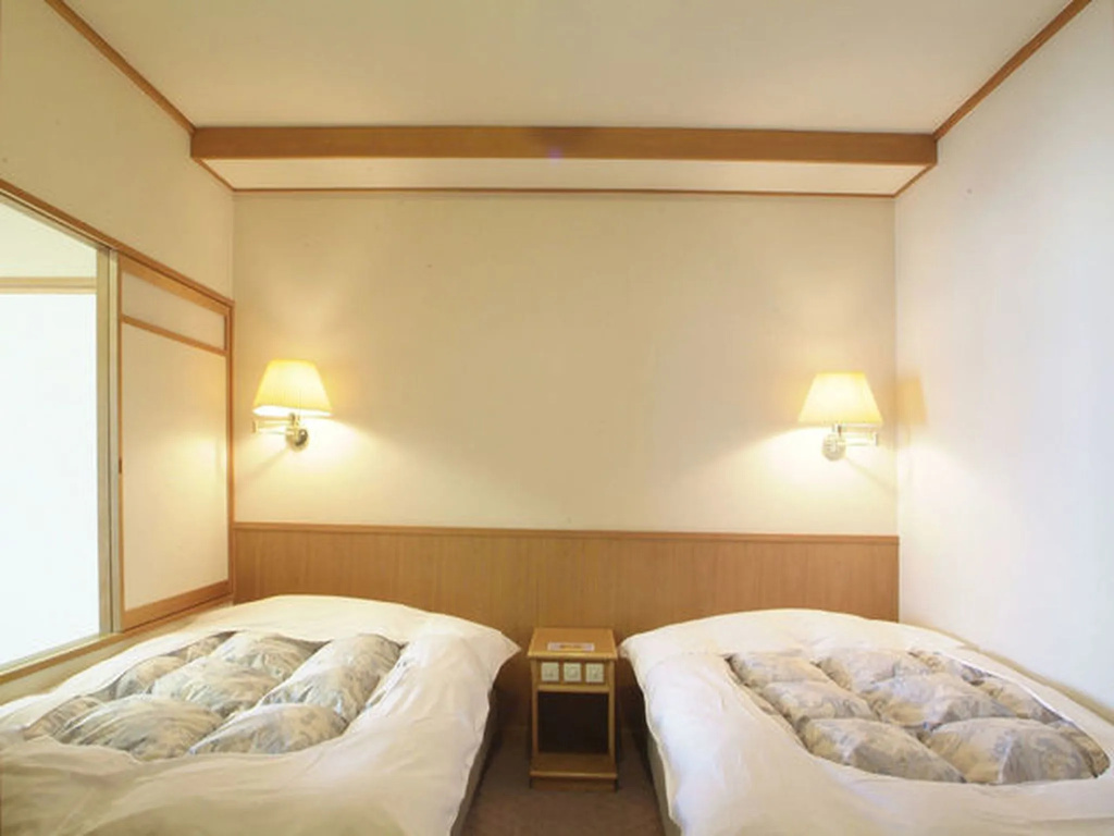 Hotel Juraku - Chambres