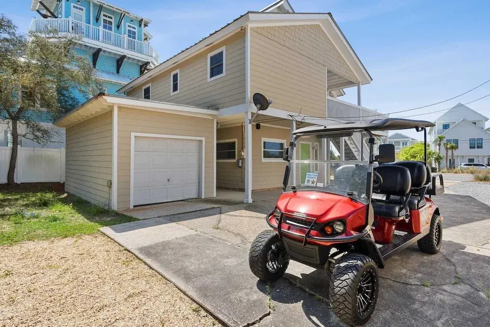 Beach Retreat w/ Sundeck, Golf Cart & Bikes Bungalow House by Avantstay