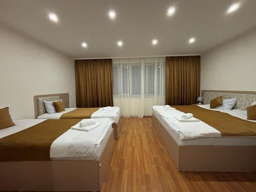 Standard Quadruple room with garden view