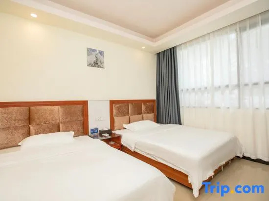 Huajun Hotel - Chambres