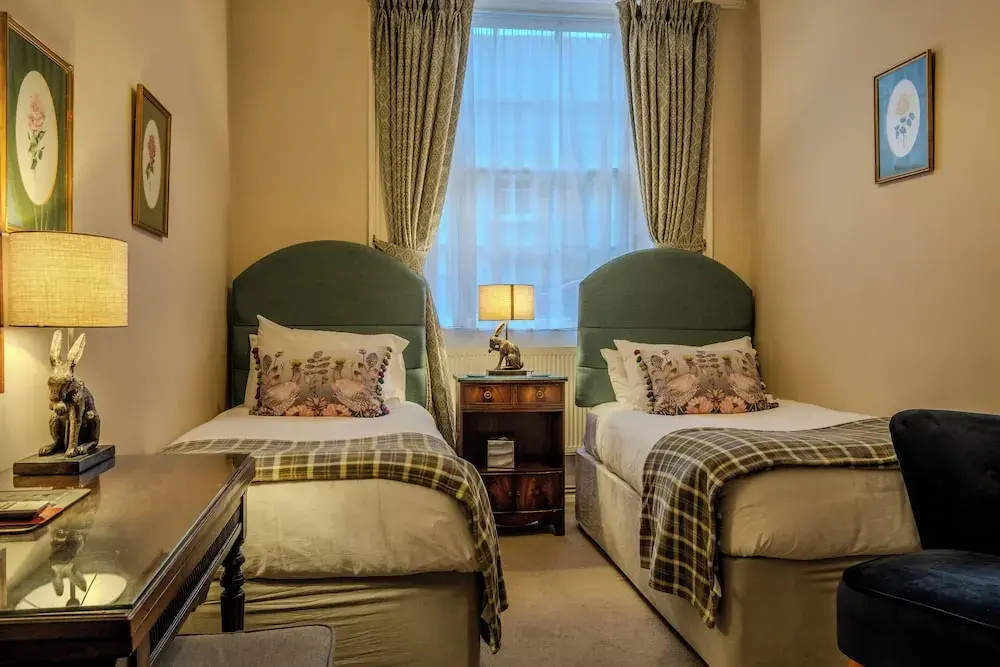 Corinium Hotel & Restaurant - Chambres