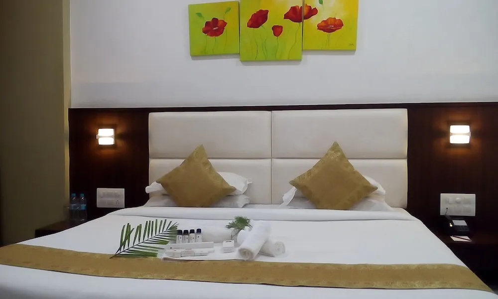 Crimson Park Shripriya Hotel - Chambres