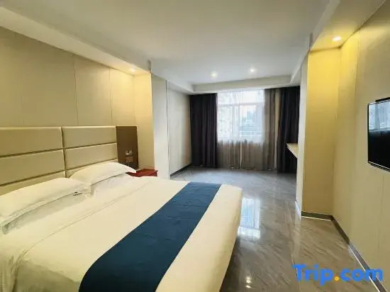 Двухместный номер Standard с видом на город двуспальная кровать в Ai Qin Hai Hotel Chain