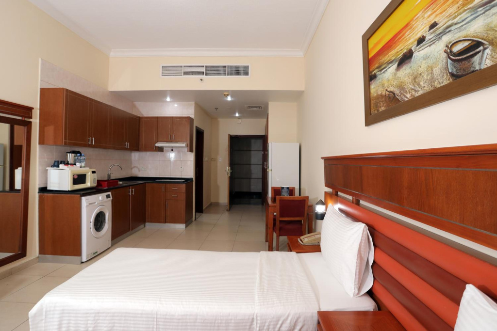 Отель Wescott Plaza Hotel Apartment в Дубае