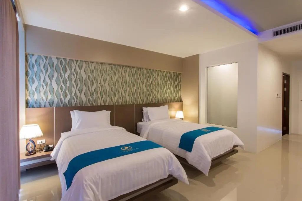 The Phu Beach Hotel - Tap to explore photos