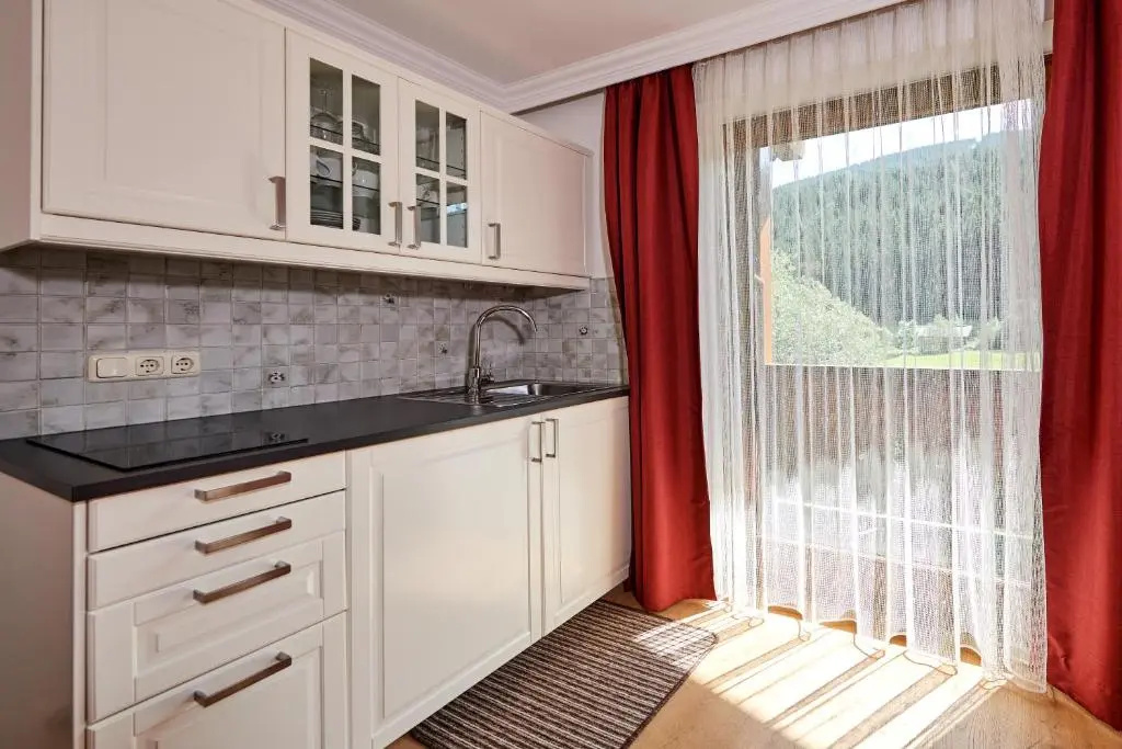 Apartments Neue Post - Chambres