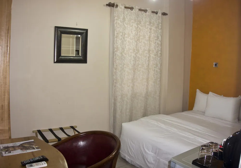 Tropical Enclave Hotel - Chambres