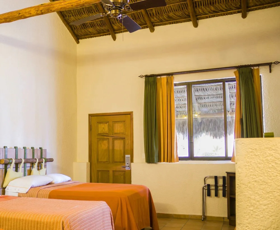 Hotel Palmas De Cortez - Chambres