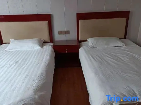 Jin Tai Hotel - Chambres