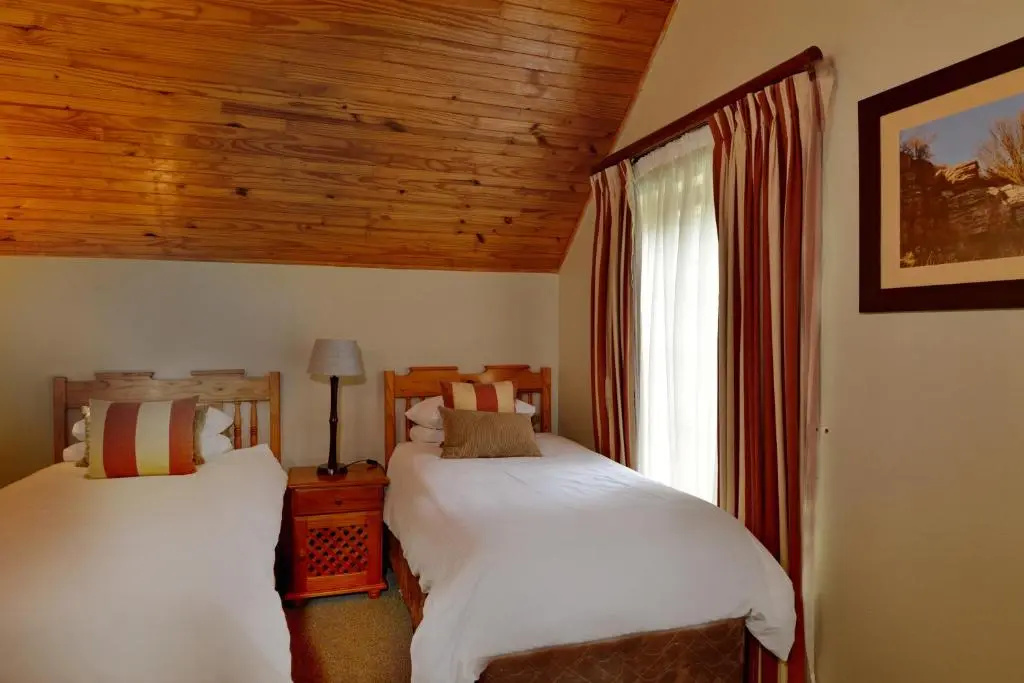 Double Chalet with balcony and with lake view twin beds