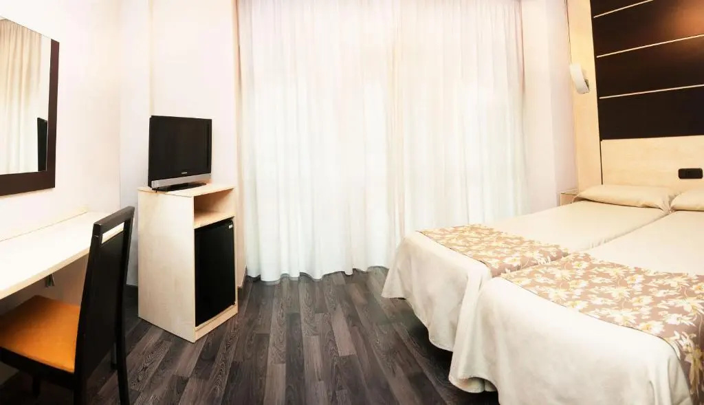 Universal Hotel - Chambres
