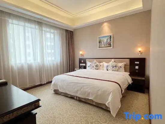 Longzhu Hotel - Chambres