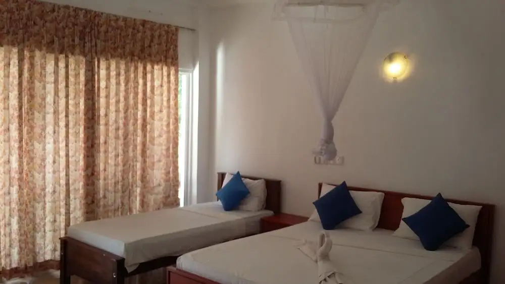 Oasis Beach Resort - Chambres