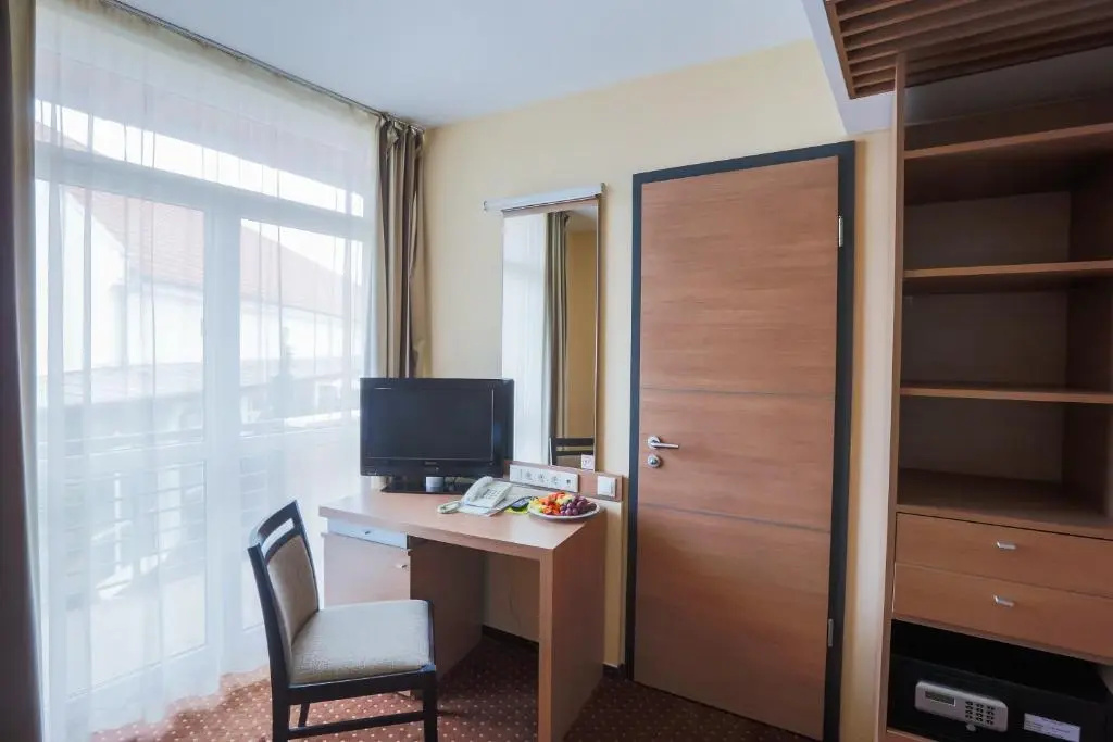CE Plaza Hotel - Chambres