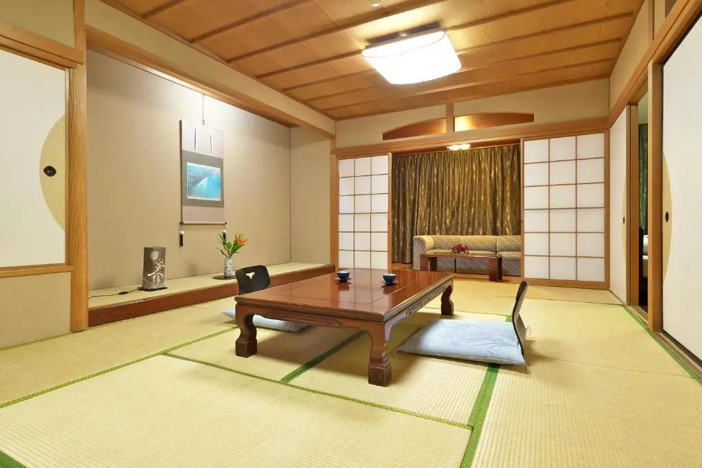 Yuraku Hotel - Chambres