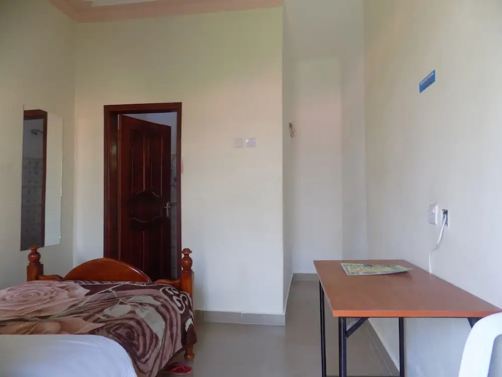 Deluxe Hotel - Ishaka - Chambres