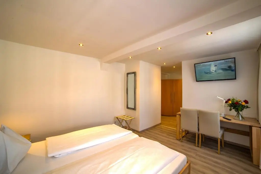 Central Garni - Chambres