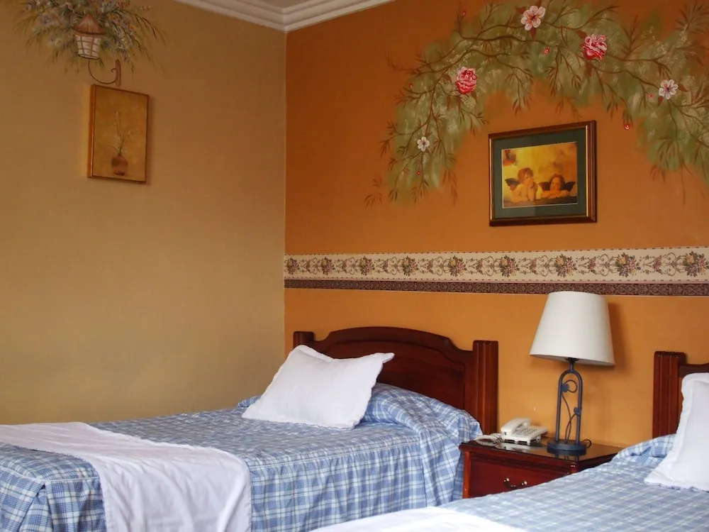 Hotel Posada del Ángel - Chambres