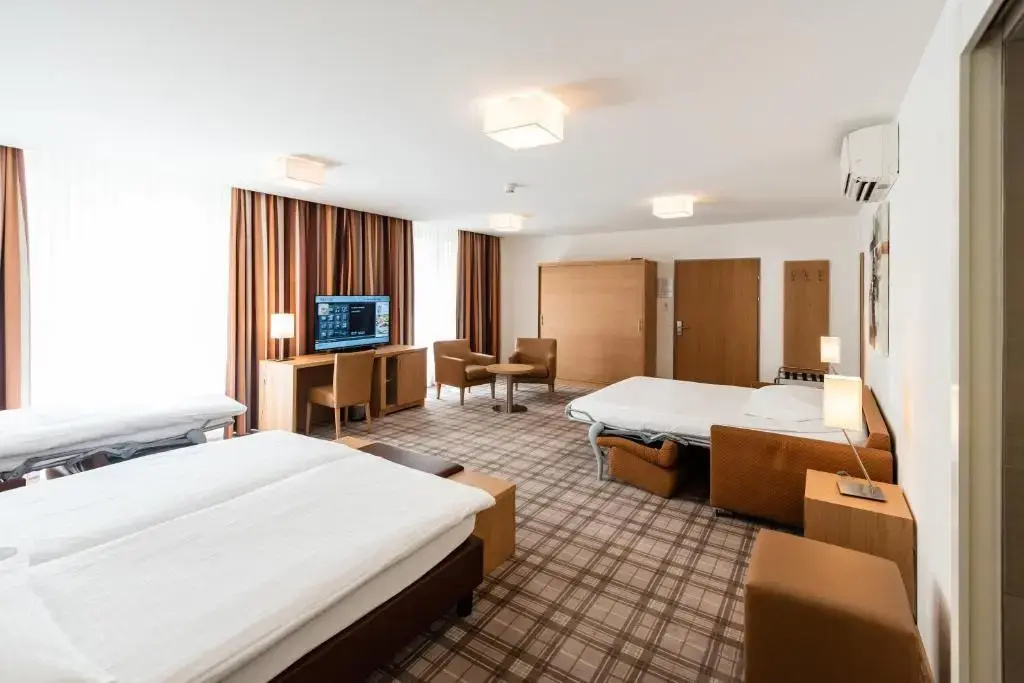 Central City Hotel Rochat - Chambres