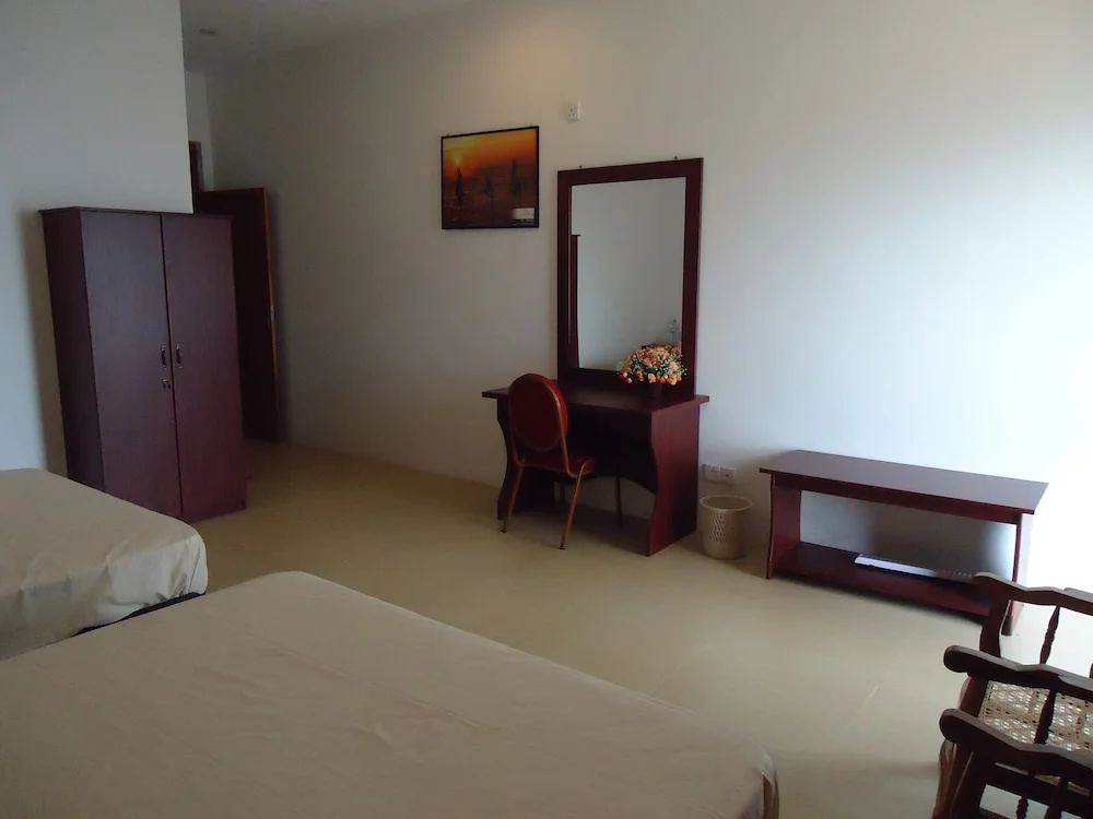 Palm Grove Holiday Inn - Chambres